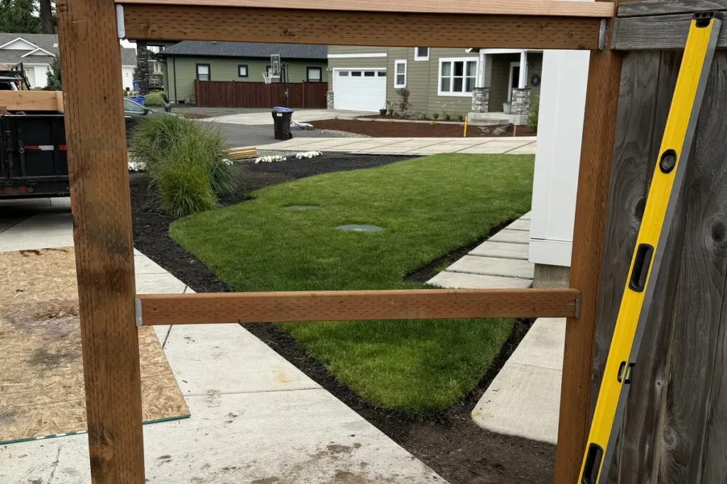 Cedar fence posts and rails framed and levelled during construction by Tekton Construction