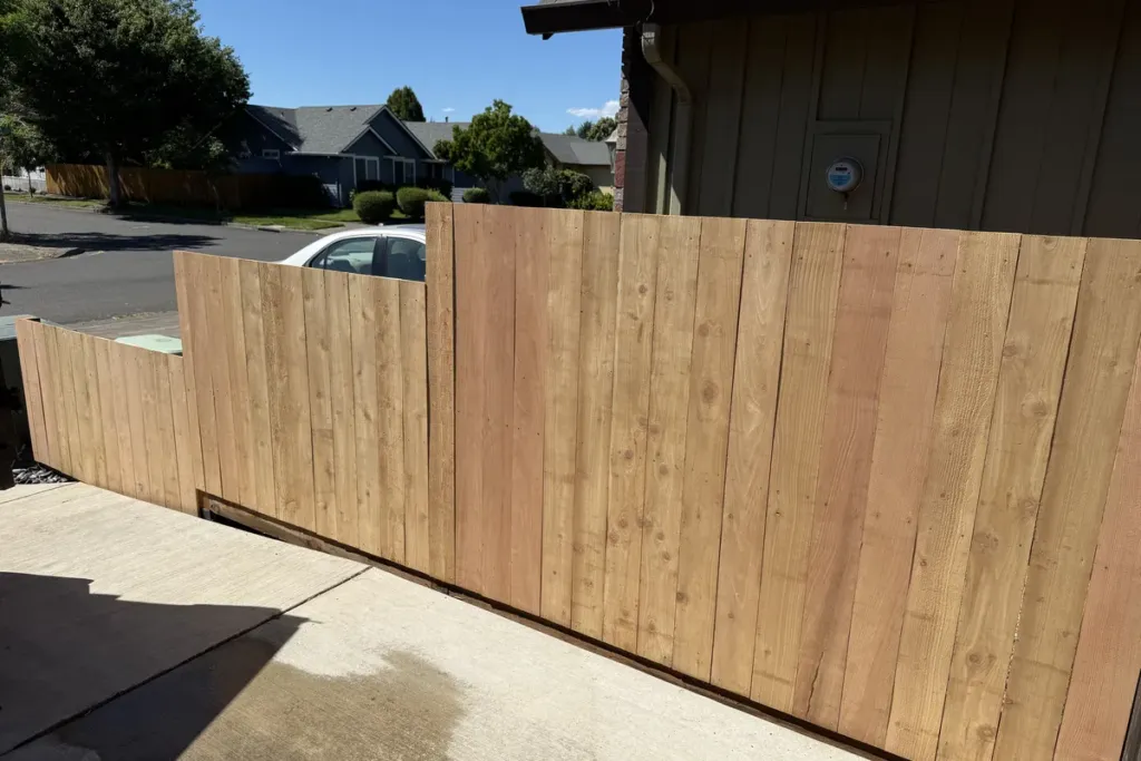 Cedar privacy fence along a street frontage built by Tekton Construction