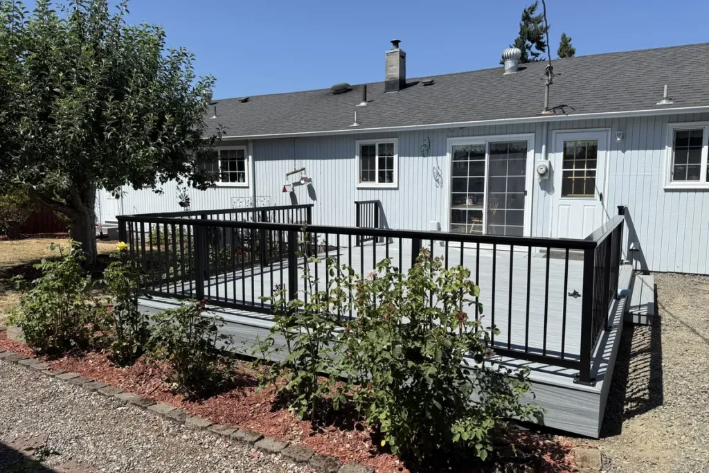 Composite deck surface and railing after full rebuild by Tekton Construction
